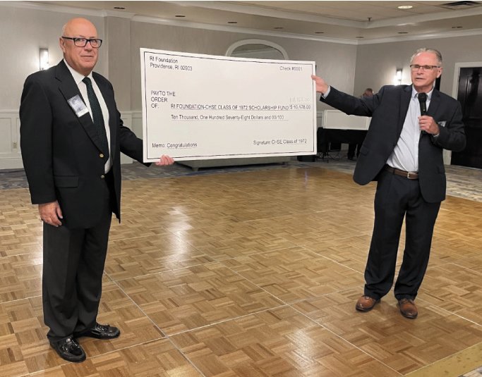 ALLEVIATING EDUCATIONAL COSTS: Michael O’Rourke (left) of the 50th reunion committee and former class President of the class of 1972 Gordon Fraser display the funds raised to endow a scholarship at the RI Foundation to benefit future Cranston East graduates. (Submitted photo)